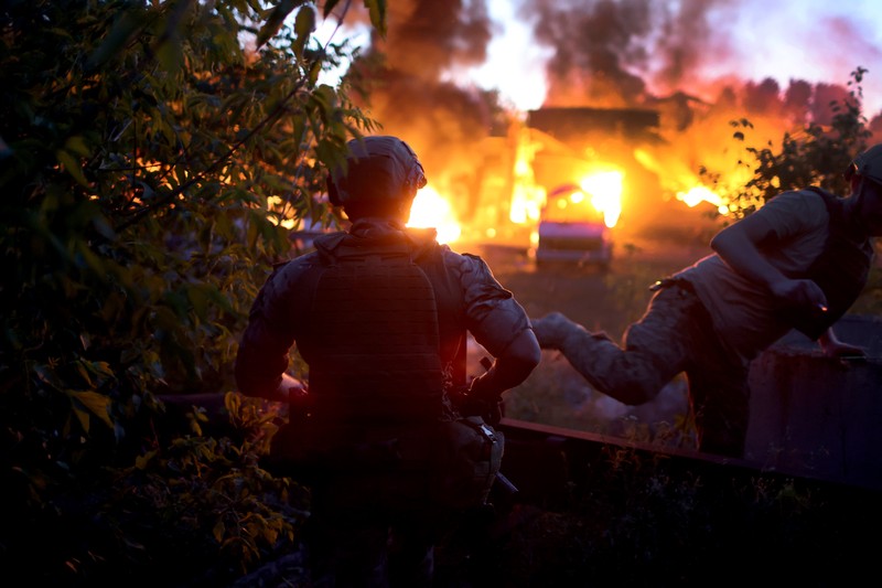 DRUZHKIVKA, UKRAINE - JUNE 20: Flames rise from a structure after it was hit by a projectile on June 20, 2022 in Druzhkivka, Ukraine. In recent weeks, Russia has concentrated its firepower on Ukraine's Donbas region, where it has long backed two separatist regions at war with the Ukrainian government since 2014. (Photo by Scott Olson/Getty Images)(Photo by Scott Olson/Getty Images)