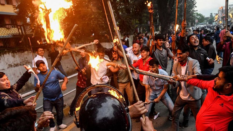 Student activists clash with police during a protest over hike in fuel prices in Kathmandu on June 20, 2022. (Photo by PRAKASH MATHEMA / AFP) (Photo by PRAKASH MATHEMA/AFP via Getty Images)