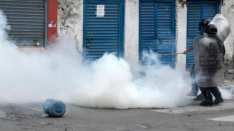 Student activists clash with police during a protest over hike in fuel prices in Kathmandu on June 20, 2022. (Photo by PRAKASH MATHEMA / AFP) (Photo by PRAKASH MATHEMA/AFP via Getty Images)