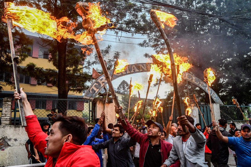 Student activists clash with police during a protest over hike in fuel prices in Kathmandu on June 20, 2022. (Photo by PRAKASH MATHEMA / AFP) (Photo by PRAKASH MATHEMA/AFP via Getty Images)