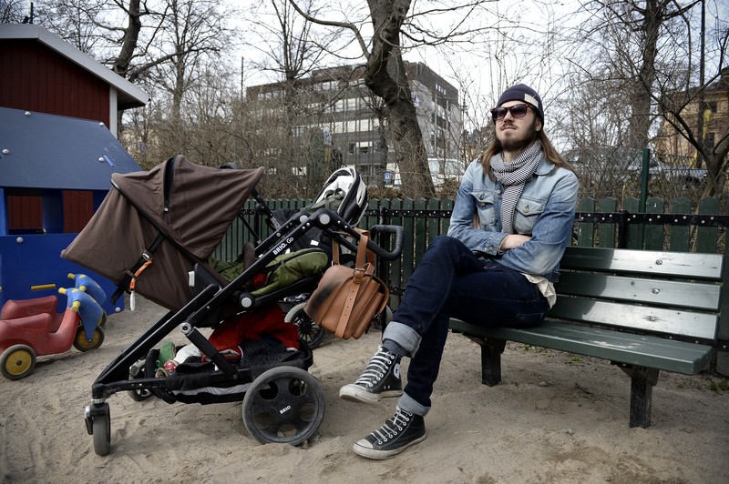 Two men take care of their babies at Humlegarden in Stockholm on September 24, 2020. - While France has just increased paternity leave to 28 days, in Sweden, a pioneer in gender equality, parents share 480 days off, which can be taken until the child's 12th birthday at 80% of the salary for the first 390 days and fathers have a minimum of three months, but only half of them take full advantage of it. (Photo by Jonathan NACKSTRAND / AFP) (Photo by JONATHAN NACKSTRAND/AFP via Getty Images)