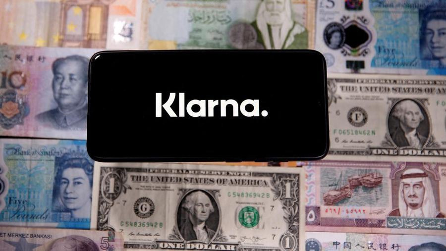 FILE PHOTO: A smartphone displays a Klarna logo on top of banknotes is in this illustration taken January 6, 2020. REUTERS/Dado Ruvic/File Photo