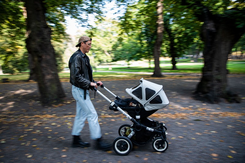 parenting Two men take care of their babies at Humlegarden in Stockholm on September 24, 2020. - While France has just increased paternity leave to 28 days, in Sweden, a pioneer in gender equality, parents share 480 days off, which can be taken until the child's 12th birthday at 80% of the salary for the first 390 days and fathers have a minimum of three months, but only half of them take full advantage of it. (Photo by Jonathan NACKSTRAND / AFP) (Photo by JONATHAN NACKSTRAND/AFP via Getty Images)