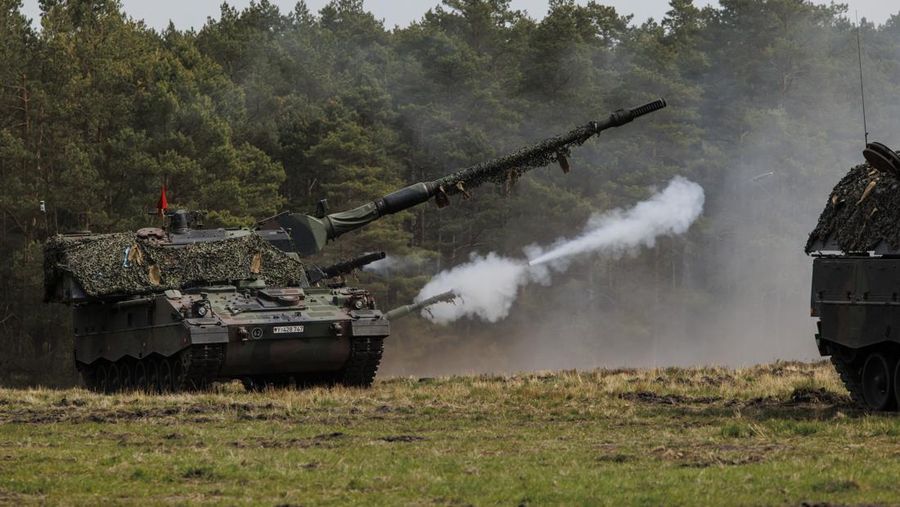 MUNSTER, GERMANY - MAY 10: Soldiers of the Bundeswehr, the German armed forces, participate with the Panzerhaubitze 2000 - the Pzh 2000 self-propelled howitzer in the Wettiner Heide (Wettiner Meadow) international joint military exercises of NATO Response Force (Land) on May 10, 2022 near Munster, Germany. The forces include the Panzergrenadierbrigade 37 (Armoured Infantry Brigade 37), which currently leads the NATO Very High Readiness Joint Task Force (VJTF). The current exercises, which run from May 2-20, include armoured and artillery units with 7,500 soldiers from nine different nations, though mainly from Germany and the Netherlands. (Photo by Morris MacMatzen/Getty Images)