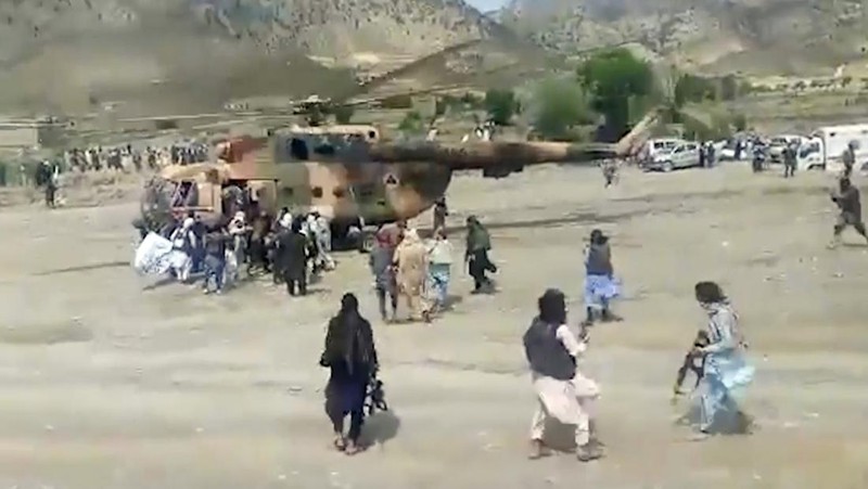 In this photo released by a set-run news agency Bakhtar, Afghans evacuate wounded in an earthquake in the province of Paktika, eastern Afghanistan, Wednesday, June 22, 2022. (Bakhtar News Agency via AP)