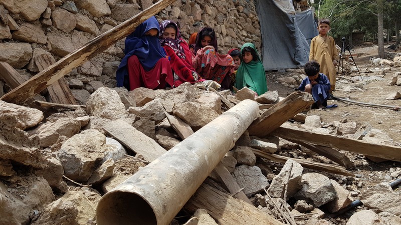 KHOST, AFGHANISTAN - JUNE 22: A view of debris after a magnitude 7.0 earthquake shook Afghanistan at noon and killed at least 29 people, and injured 62 others in the Spera district of Khost province near Paktika province, Afghanistan on June 22, 2022.. The district chief, Sultan Mahmood Ghaznavi, said the quake had destroyed about 500 houses in different parts of the district, adding that they were trying to assist the affected families in Khost. (Photo by Sardar Shafaq/Anadolu Agency via Getty Images)