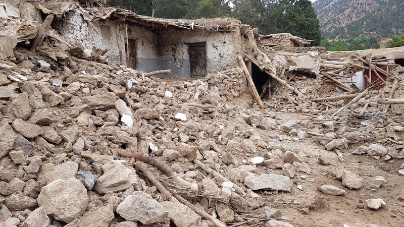 1241459944 KHOST, AFGHANISTAN - JUNE 22: A view of debris after a magnitude 7.0 earthquake shook Afghanistan at noon and killed at least 29 people, and injured 62 others in the Spera district of Khost province near Paktika province, Afghanistan on June 22, 2022.. The district chief, Sultan Mahmood Ghaznavi, said the quake had destroyed about 500 houses in different parts of the district, adding that they were trying to assist the affected families in Khost. (Photo by Sardar Shafaq/Anadolu Agency via Getty Images)