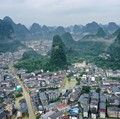 GUILIN, CHINA - JUNE 22, 2022 - Flood waters of Lijiang River Scenic Area in Yangshuo, Guangxi Zhuang Autonomous Region, China, June 22, 2022. (Photo credit should read CFOTO/Future Publishing via Getty Images)