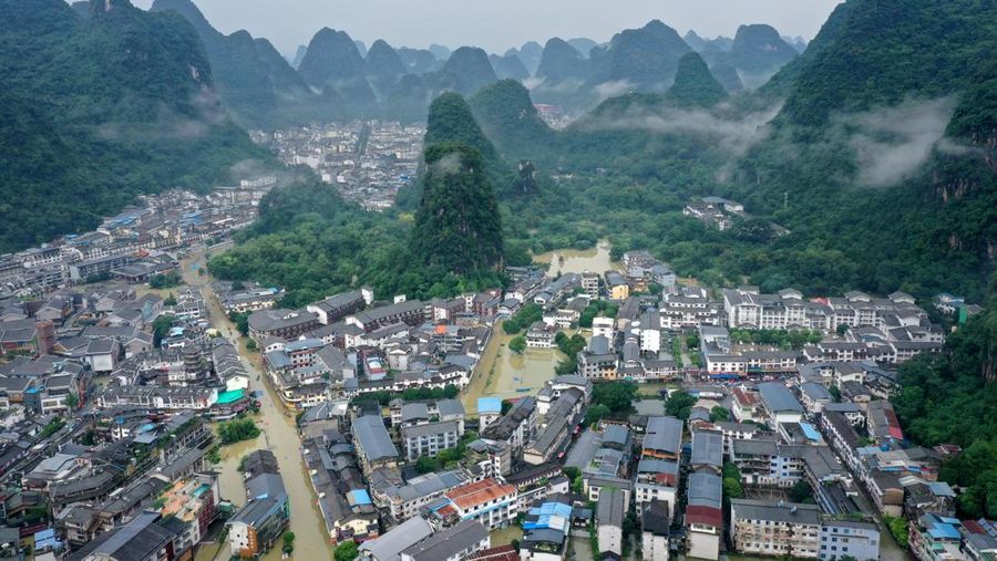 GUILIN, CHINA - JUNE 22, 2022 - Flood waters of Lijiang River Scenic Area in Yangshuo, Guangxi Zhuang Autonomous Region, China, June 22, 2022. (Photo credit should read CFOTO/Future Publishing via Getty Images)