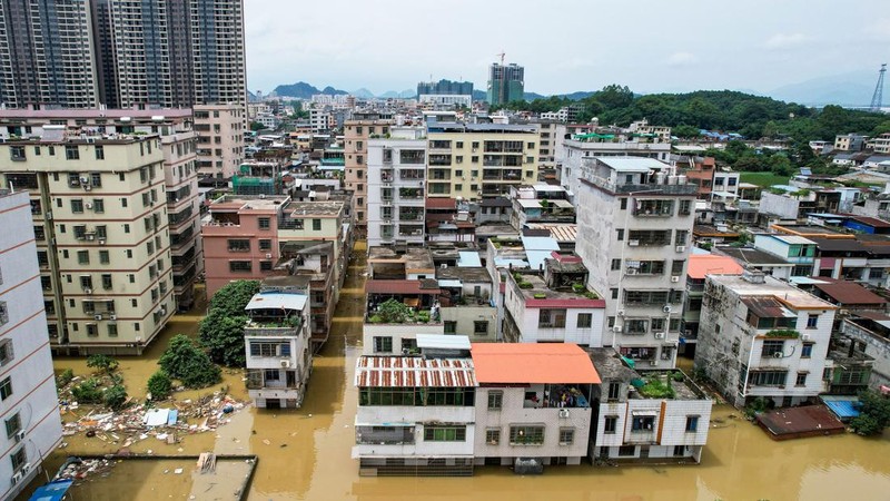 QINGYUAN, CHINA - JUNE 22: Aerial view of residential houses surrounded by flood water after torrential rains on June 22, 2022 in Qingyuan, Guangdong Province of China. Flood control authority of China's Guangdong Province activated a Level-I emergency response on Tuesday. (Photo by VCG/VCG via Getty Images)