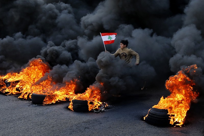 Lebanon Sri Lanka Collapse FILE- This photo shows a general view of the scene of an explosion that hit the seaport of Beirut, Lebanon, Wednesday, Aug. 5, 2020. On Aug. 4, 2020, a catastrophic explosion struck Beirut's port, killing at least 216 people and wrecking large parts of the city. The blast, widely considered one of the largest non-nuclear explosions in history, was caused by the detonation of hundreds of tons of ammonium nitrate that was stored in a warehouse for years. (AP Photo/Bilal Hussein, File)