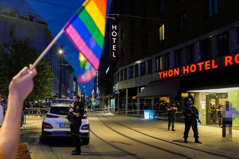 Norway Shooting Police gather at the site of a mass shooting in Oslo, early Saturday, June 25, 2022. Norwegian police say a few people have been killed and more than a dozen injured in a mass shooting. (Javad Parsa/NTB via AP)