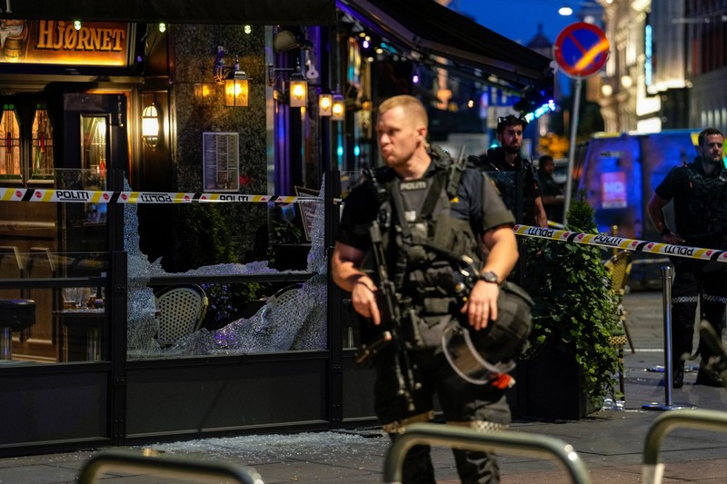 Norway Shooting Police gather at the site of a mass shooting in Oslo, early Saturday, June 25, 2022. Norwegian police say a few people have been killed and more than a dozen injured in a mass shooting. (Javad Parsa/NTB via AP)