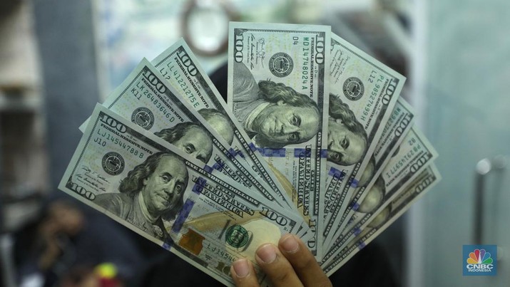 Ilustrasi dolar Amerika Serikat (AS). Ilustrasi dolar Amerika Serikat (AS). (CNBC Indonesia/ Tri Susilo)