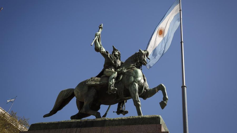 The monument to General Belgrano and the Argentine Flag are seen in Plaza de Mayo in Buenos Aires, Argentina, September 17, 2015. (Photo by John Gress/Corbis via Getty Images)