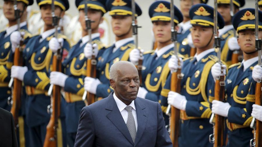FILE PHOTO: Angola's President Jose Eduardo Dos Santos inspects honour guards during a welcoming ceremony outside the Great Hall of the People in Beijing, June 9, 2015. REUTERS/Jason Lee/File Photo