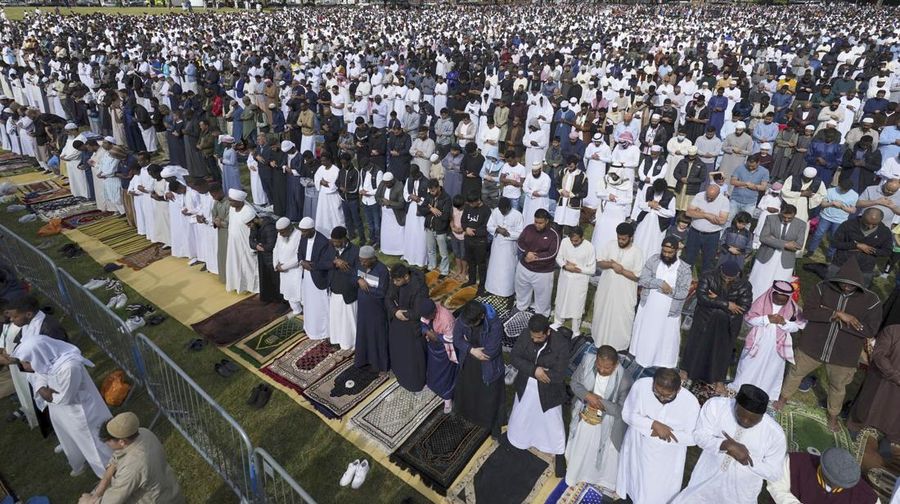 Muslim pilgrims walk to cast stones at a pillar in the symbolic stoning of the devil, during the last rite of the annual hajj, and the first day of Eid al-Adha, in Mina near the city of Mecca, Saudi Arabia, Saturday, July 9, 2022. (AP Photo/Amr Nabil)