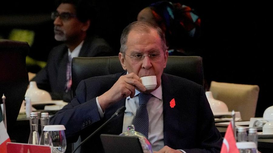 Russian Foreign Minister Sergey Lavrov sips his drink prior to the start of the opening session of the G20 Foreign Ministers' Meeting in Nusa Dua, Bali, Indonesia July 8, 2022. Dita Alangkara/Pool via Reuters