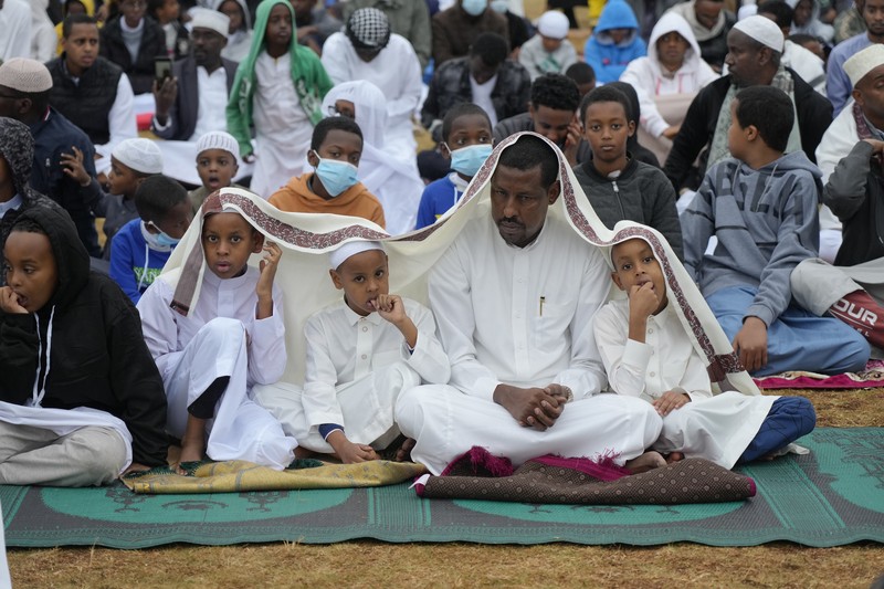 Saudi Arabia Hajj Muslim pilgrims walk to cast stones at a pillar in the symbolic stoning of the devil, during the last rite of the annual hajj, and the first day of Eid al-Adha, in Mina near the city of Mecca, Saudi Arabia, Saturday, July 9, 2022. (AP Photo/Amr Nabil)