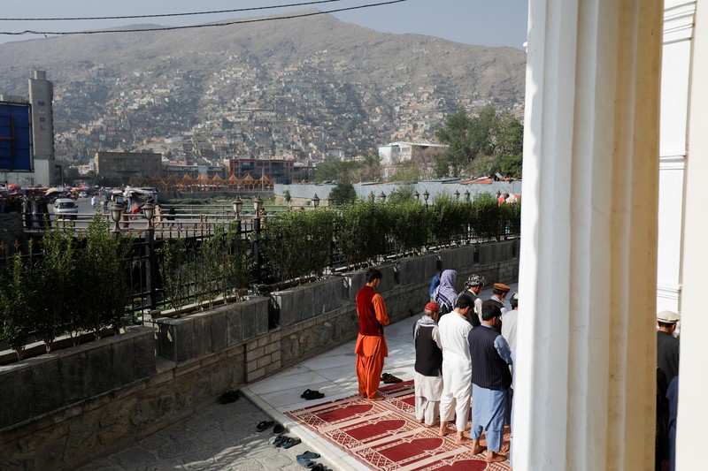 Saudi Arabia Hajj Muslim pilgrims walk to cast stones at a pillar in the symbolic stoning of the devil, during the last rite of the annual hajj, and the first day of Eid al-Adha, in Mina near the city of Mecca, Saudi Arabia, Saturday, July 9, 2022. (AP Photo/Amr Nabil)