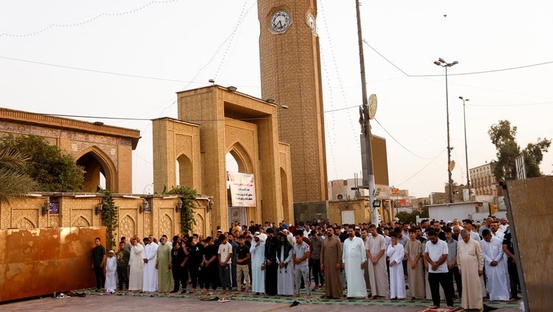 Muslim pilgrims walk to cast stones at a pillar in the symbolic stoning of the devil, during the last rite of the annual hajj, and the first day of Eid al-Adha, in Mina near the city of Mecca, Saudi Arabia, Saturday, July 9, 2022. (AP Photo/Amr Nabil)