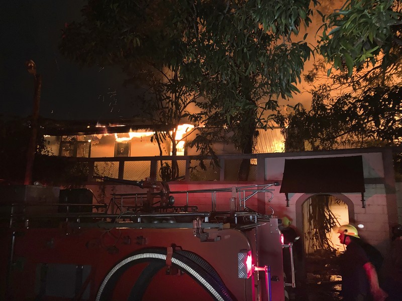 A fire burns at Prime Minister Ranil Wickremesinghe's house, after it was set on fire by protestors, amid the country's economic crisis, in Colombo, Sri Lanka, July 9, 2022 in this screen grab obtained from social media video. Pradas S Agnya/via REUTERS  THIS IMAGE HAS BEEN SUPPLIED BY A THIRD PARTY. MANDATORY CREDIT.