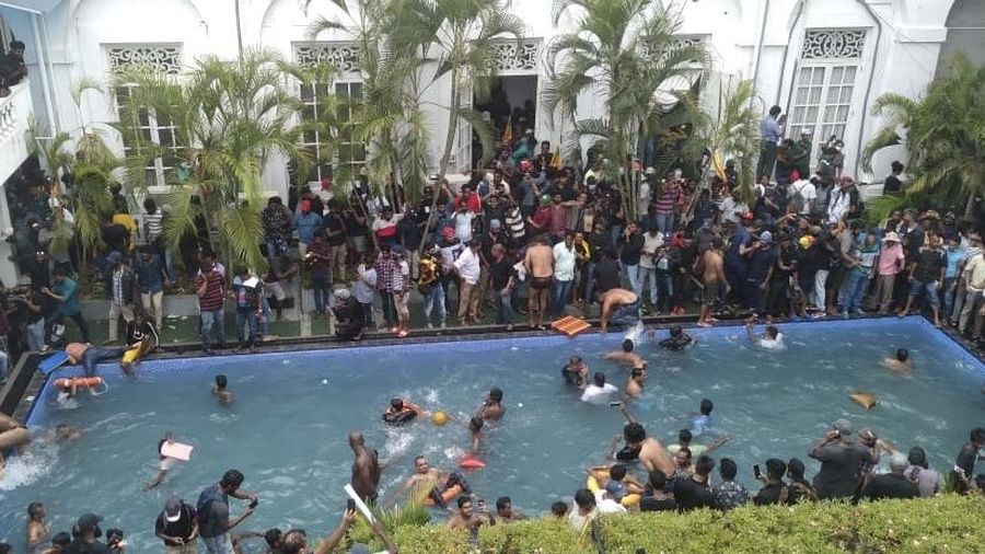 Demonstrators protest inside the President's House premises, after President Gotabaya Rajapaksa fled, amid the country's economic crisis, in Colombo, Sri Lanka, July 9, 2022. REUTERS/Dinuka Liyanawatte