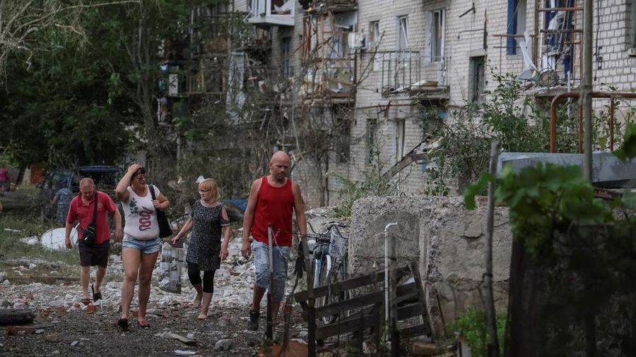 Rescue operation is underway after a missile strike, amid Russia's invasion of Ukraine, at a location given as Chasiv Yar, Ukraine, in this handout image released July 10, 2022. Donetsk region governor Pavlo Kyrylenko/Handout via REUTERS ATTENTION EDITORS    THIS IMAGE HAS BEEN SUPPLIED BY A THIRD PARTY. NO RESALES. NO ARCHIVES. MANDATORY CREDIT.