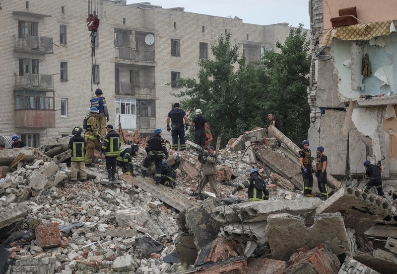Rescue operation is underway after a missile strike, amid Russia's invasion of Ukraine, at a location given as Chasiv Yar, Ukraine, in this handout image released July 10, 2022. Donetsk region governor Pavlo Kyrylenko/Handout via REUTERS ATTENTION EDITORS    THIS IMAGE HAS BEEN SUPPLIED BY A THIRD PARTY. NO RESALES. NO ARCHIVES. MANDATORY CREDIT.