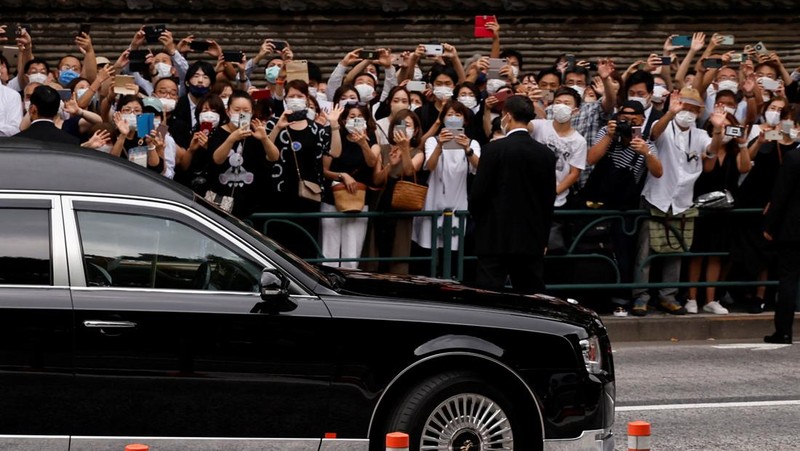 Akie Abe, wife of late former Japanese Prime Minister Shinzo Abe, who was shot while campaigning for a parliamentary election, sits in a vehicle carrying Abe's body, as she leaves after his funeral at Zojoji Temple in Tokyo, Japan July 12, 2022. REUTERS/Issei Kato