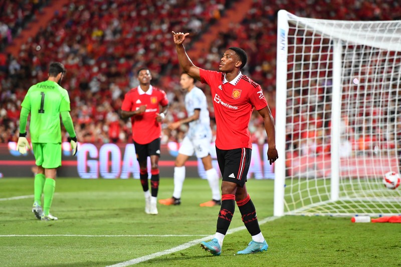 Manchester United Jadon Sancho, left, shoot to score during their pre-season kicks Rajamangala national stadium In Bangkok, Thailand, Tuesday, July 12, 2022. Manchester United beat Liverpool 4-0. (AP Photo/Wason Wanichakorn)