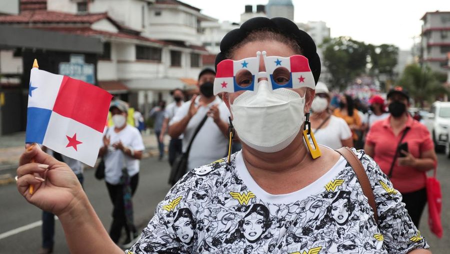 A demonstrator holding a Panamanian flag takes part in a protest to demand the government steps to curb inflation, lower fuel and food prices, in Panama City, Panama July 12, 2022. REUTERS/Erick Marciscano
