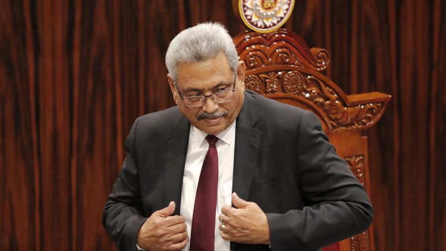 FILE - Sri Lankan President Gotabaya Rajapaksa leaves after addressing parliament during the ceremonial inauguration of the session, in Colombo, Sri Lanka on Jan. 3, 2020. The president of Sri Lanka fled the country early Wednesday, July 13, 2022, days after protesters stormed his home and office and the official residence of his prime minister amid a three-month economic crisis that triggered severe shortages of food and fuel.(AP Photo/Eranga Jayawardena, File)