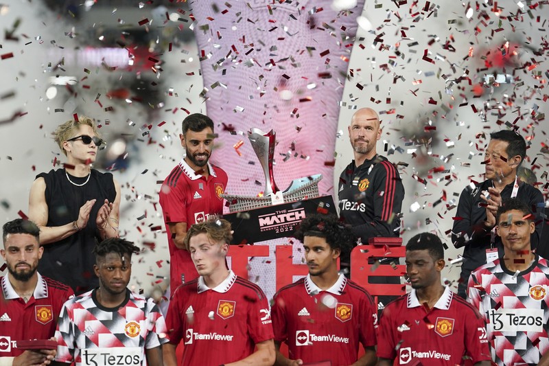 Thailand Manchester United Liverpool Soccer Manchester United Jadon Sancho, left, shoot to score during their pre-season kicks Rajamangala national stadium In Bangkok, Thailand, Tuesday, July 12, 2022. Manchester United beat Liverpool 4-0. (AP Photo/Wason Wanichakorn)
