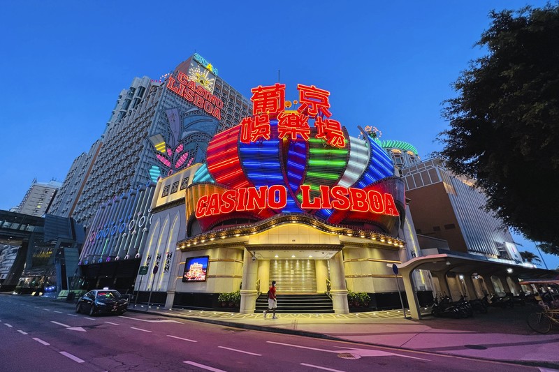 Virus Outbreak Macao Casino Lisboa is closed in Macao, Monday, July 11, 2022. Streets in the gambling center of Macao were empty Monday after casinos and most other businesses were ordered to close while the Chinese territory near Hong Kong fights a coronavirus outbreak. (AP Photo/Kong)