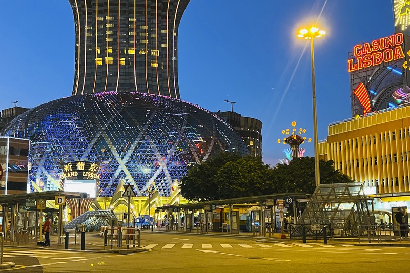 Virus Outbreak Macao Casino Lisboa is closed in Macao, Monday, July 11, 2022. Streets in the gambling center of Macao were empty Monday after casinos and most other businesses were ordered to close while the Chinese territory near Hong Kong fights a coronavirus outbreak. (AP Photo/Kong)