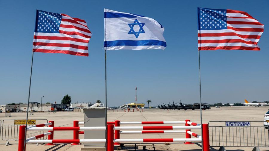 Israeli and American flags stand during the final rehearsal for the ceremony to welcome U.S. President Joe Biden ahead of his visit to Israel, at Ben Gurion International airport, in Lod near Tel Aviv, Israel July 12, 2022. REUTERS/Amir Cohen