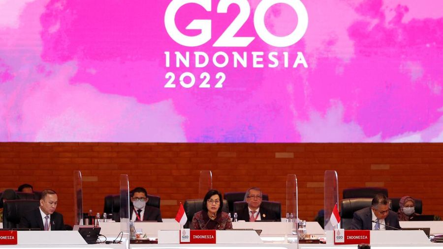 Indonesia's Finance Minister Mulyani Indrawati (C) delivers a speech during the opening of the G20 Finance Ministers and Central Bank Governors Meeting in Nusa Dua, Bali, Indonesia, 15 July 2022. Made Nagi/Pool via REUTERS