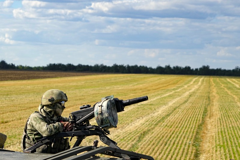 Ukraine Russia A Russian soldier atop of a military truck with the letter Z, which has become a symbol of the Russian military, and a hashtag reading