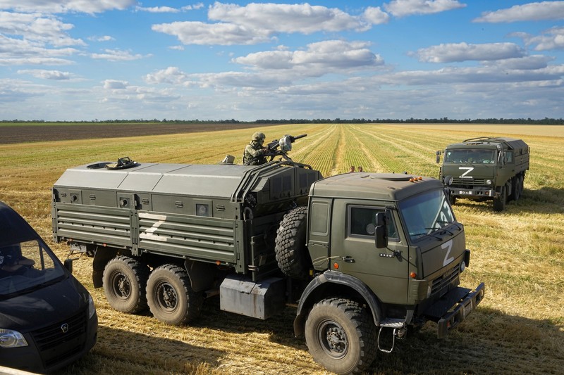 Ukraine Russia A Russian soldier atop of a military truck with the letter Z, which has become a symbol of the Russian military, and a hashtag reading