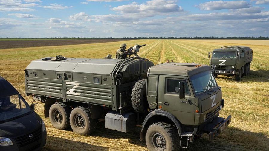 Farmers of the Voznesenka-Agro farm harvest with their combine in a wheat field not far from Melitopol, south Ukraine, Thursday, July 14, 2022. About 300,000 tonnes of harvest have been collected in Melitopol district of Zaporizhzhia region. Russia took control of part of the Zaporizhzhia region quickly after the launch of the military operation in Ukraine. This photo was taken during a trip organized by the Russian Ministry of Defense. (AP Photo)