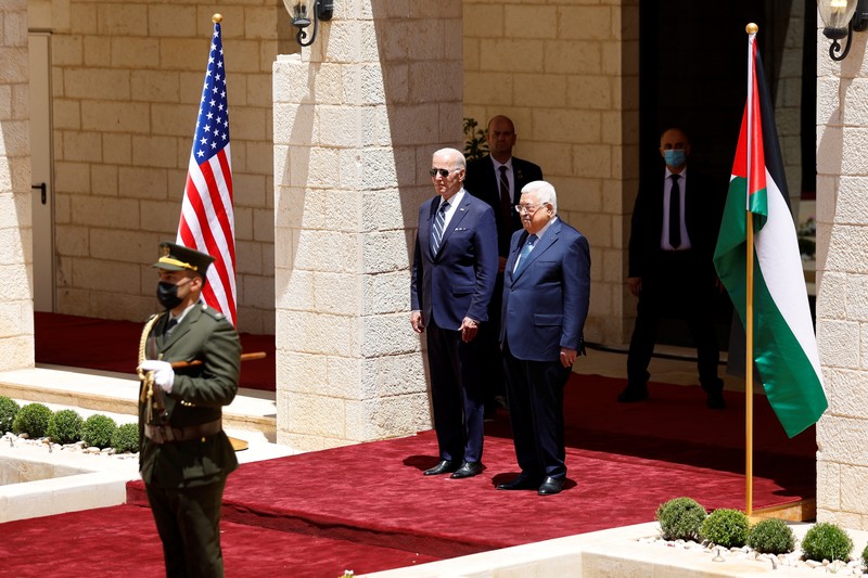 USA-PALESTINIANS/BIDEN-ABBAS U.S. President Joe Biden shakes hands with Palestinian President Mahmoud Abbas at the Presidential Compound, in Bethlehem, in the Israeli-occupied West Bank July 15, 2022. REUTERS/Evelyn Hockstein