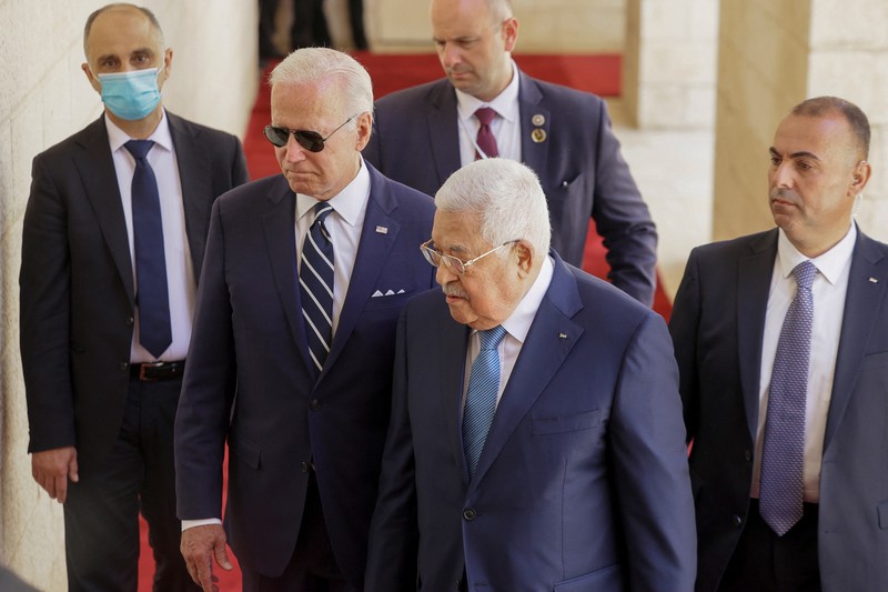USA-PALESTINIANS/BIDEN-ABBAS U.S. President Joe Biden shakes hands with Palestinian President Mahmoud Abbas at the Presidential Compound, in Bethlehem, in the Israeli-occupied West Bank July 15, 2022. REUTERS/Evelyn Hockstein