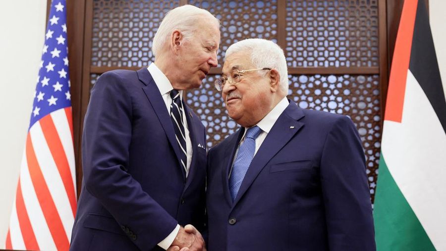 U.S. President Joe Biden shakes hands with Palestinian President Mahmoud Abbas at the Presidential Compound, in Bethlehem, in the Israeli-occupied West Bank July 15, 2022. REUTERS/Evelyn Hockstein
