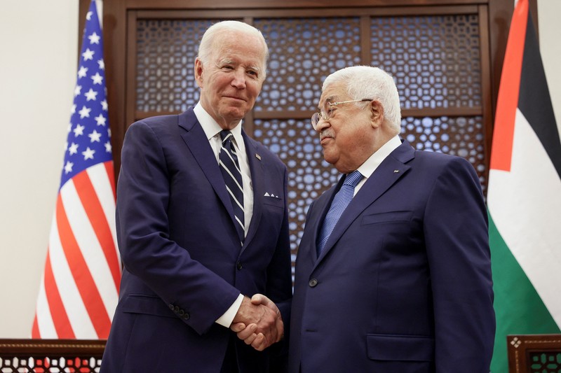 USA-PALESTINIANS/BIDEN-ABBAS U.S. President Joe Biden shakes hands with Palestinian President Mahmoud Abbas at the Presidential Compound, in Bethlehem, in the Israeli-occupied West Bank July 15, 2022. REUTERS/Evelyn Hockstein