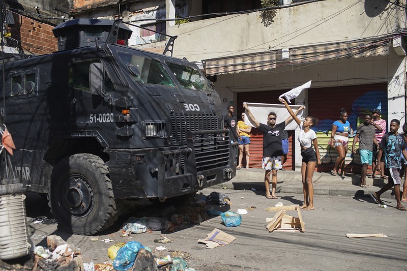 Polisi melakukan operasi di favela Complexo do Alemao di Rio de Janeiro, Brasil, Kamis, 21 Juli 2022. (AP/Silvia Izquierdo) Polisi melakukan operasi di favela Complexo do Alemao di Rio de Janeiro, Brasil, Kamis, 21 Juli 2022. (AP/Silvia Izquierdo)