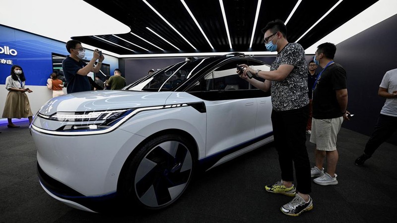 This picture taken on July 20, 2022 shows Baidu's Apollo RT6 next-generation autonomous vehicle during its unveiling in Beijing. - The Apollo RT6 is designed for fully autonomous driving with detachable steering wheel, and is set to join the Apollo Go ride-hailing service starting in 2023. (Photo by Noel Celis / AFP) (Photo by NOEL CELIS/AFP via Getty Images)