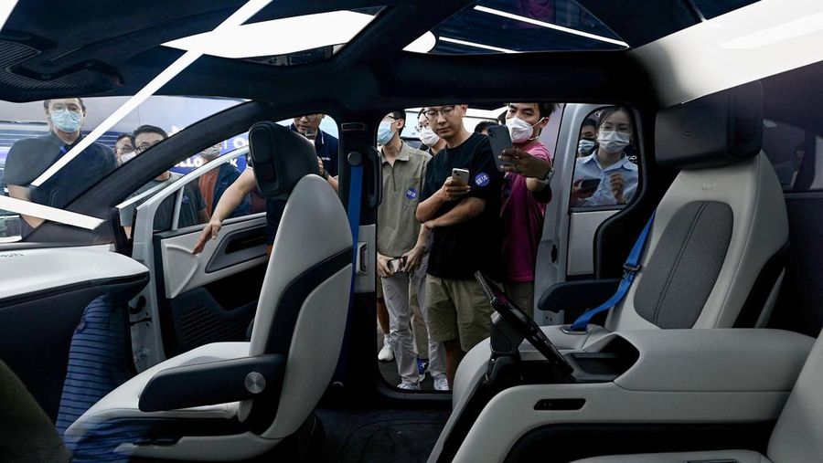 This picture taken on July 20, 2022 shows Baidu's Apollo RT6 next-generation autonomous vehicle during its unveiling in Beijing. - The Apollo RT6 is designed for fully autonomous driving with detachable steering wheel, and is set to join the Apollo Go ride-hailing service starting in 2023. (Photo by Noel Celis / AFP) (Photo by NOEL CELIS/AFP via Getty Images)