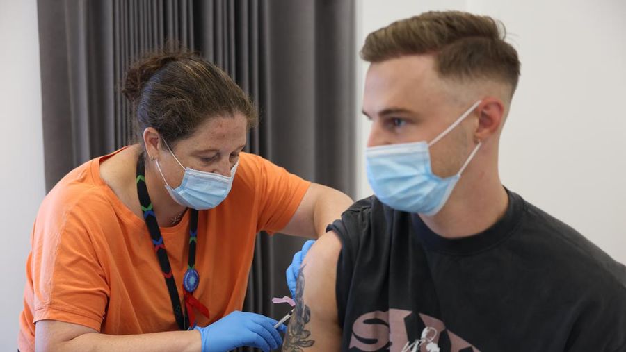 LONDON, ENGLAND - JULY 23: Nurse, Gabby Monk administers a dose of the monkeypox vaccine on July 23, 2022 in London, England. The NHS is expanding its  rollout in London as monkeypox cases continue to increase in the capital. Monkeypox, a rare disease, is part of the same family of viruses as smallpox. (Photo by Hollie Adams/Getty Images)