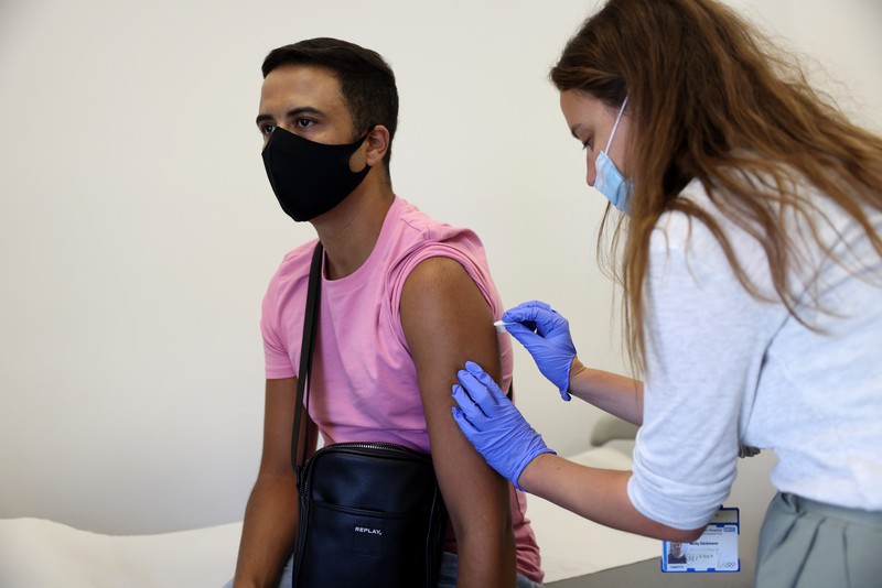 LONDON, ENGLAND - JULY 23: Nurse, Gabby Monk administers a dose of the monkeypox vaccine on July 23, 2022 in London, England. The NHS is expanding its  rollout in London as monkeypox cases continue to increase in the capital. Monkeypox, a rare disease, is part of the same family of viruses as smallpox. (Photo by Hollie Adams/Getty Images)